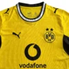 Borussia Dortmund yellow and black football jersey with Vodafone logo.