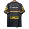 Pickleball Sports Jersey for Competitive Play Black pickleball jersey with colorful sponsor logos and stripes, ideal for sports enthusiasts.