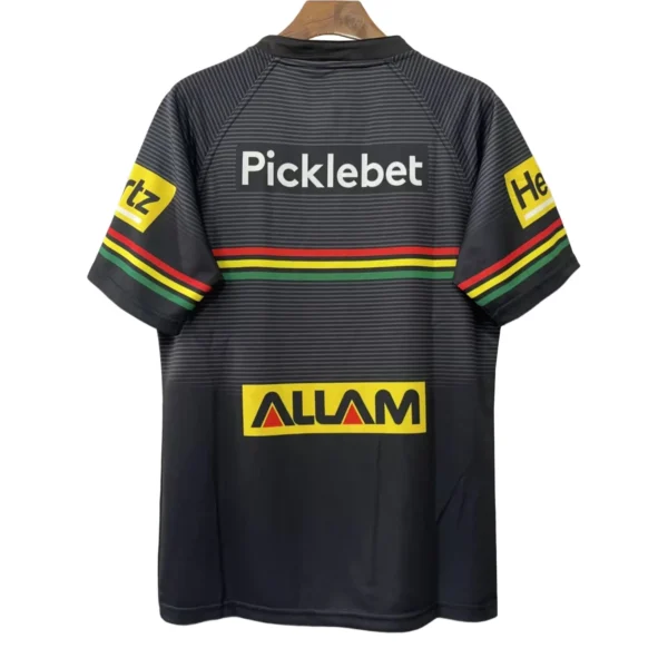 Pickleball Sports Jersey for Competitive Play Black pickleball jersey with colorful sponsor logos and stripes, ideal for sports enthusiasts.