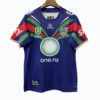 New Zealand Warriors rugby jersey with team logos and sponsor branding.