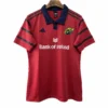 Sports jersey featuring team crest, sponsor logo, and stylish design elements.