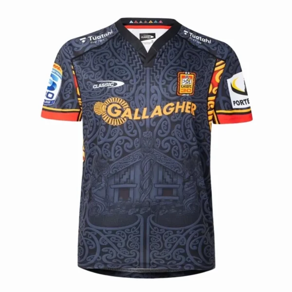Sports jersey with Maori-inspired design and sponsor logos, ideal for rugby fans. Rugby jersey featuring Maori art design, sponsor logos, and team emblem for sports enthusiasts.