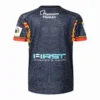 Sports jersey with intricate tribal design and sponsor logos. Sports jersey with tribal pattern, sponsor logos, and vibrant colors.