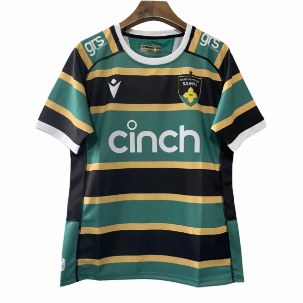 Northampton Saints Rugby Jersey Rugby jersey featuring Northampton Saints logo and sponsor CINCH, with green, black, and gold stripe.