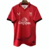 Kingspan Uster Rugby Jersey for Men Red Kingspan Uster rugby jersey with black accents and sponsor logos.