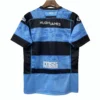 Blue and black sports jersey with Hugh James logo for athletic wear.