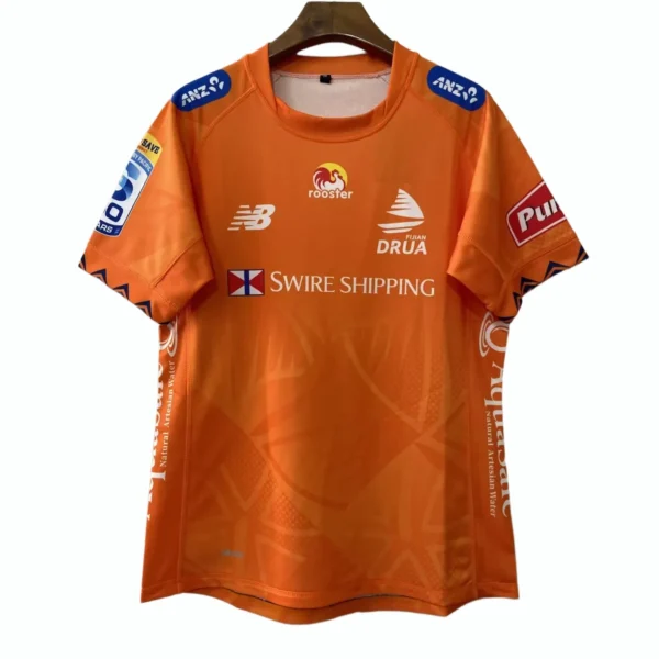 Football jersey with sponsor logos and vibrant orange color for sports fans and athletes. Orange sports jersey with sponsor logos, ideal for football players and sports enthusiasts.
