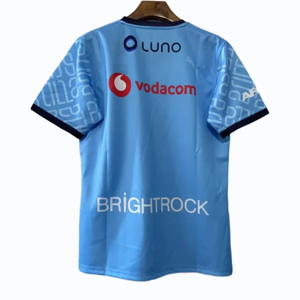 Cricket Jersey with Sponsor Logos Blue cricket jersey featuring Luno, Vodacom, and Brightrock sponsor logos.