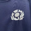 Sportswear logo on navy athletic shirt Athletic shirt with sportswear logo, ideal for training and active lifestyles.