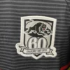 Celebrating 60 Years of Excellence Embroidered patch featuring a fierce black panther and the number 60, symbolizing six decades of spo.