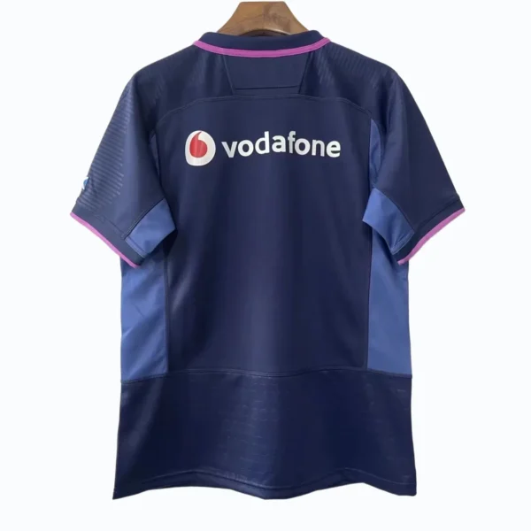 Football Jersey with Vodafone Logo for Sports Enthusiasts Blue football jersey featuring Vodafone logo, ideal for sports fans and team uniforms.