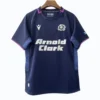 Football Jersey with Arnold Clark Sponsorship Navy blue football jersey with Arnold Clark logo and team emblem, short sleeves, sportswear for athl.